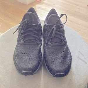 Gently used Nike running shoes women’s size 9.